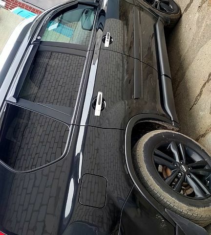 Черный Ниссан ИксТрейл, объемом двигателя 2 л и пробегом 205 тыс. км за 7800 $, фото 2 на Automoto.ua