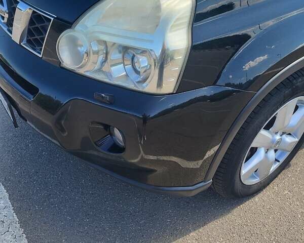 Чорний Ніссан ІксТрейл, об'ємом двигуна 2.49 л та пробігом 240 тис. км за 8700 $, фото 10 на Automoto.ua