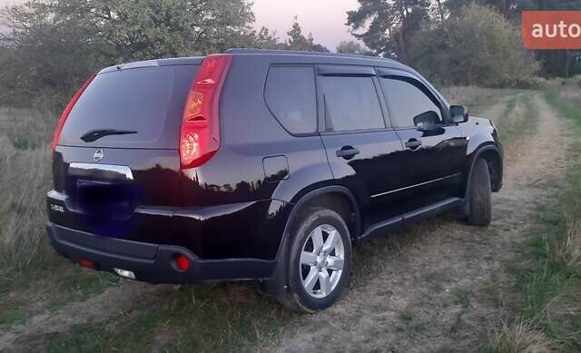 Черный Ниссан ИксТрейл, объемом двигателя 2 л и пробегом 182 тыс. км за 9300 $, фото 25 на Automoto.ua