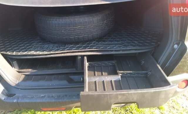 Черный Ниссан ИксТрейл, объемом двигателя 2 л и пробегом 182 тыс. км за 9300 $, фото 2 на Automoto.ua