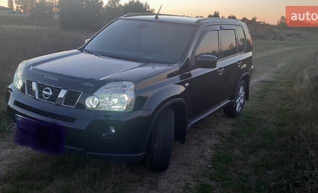 Черный Ниссан ИксТрейл, объемом двигателя 2 л и пробегом 182 тыс. км за 9300 $, фото 18 на Automoto.ua