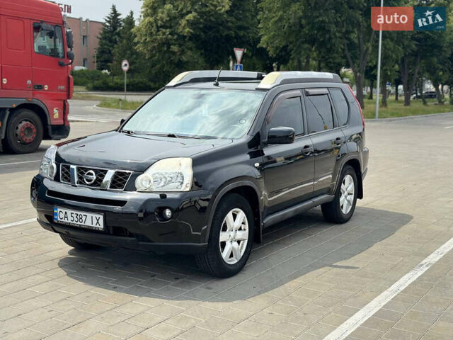 Чорний Ніссан ІксТрейл, об'ємом двигуна 2 л та пробігом 165 тис. км за 9200 $, фото 3 на Automoto.ua