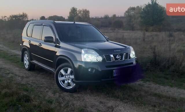 Черный Ниссан ИксТрейл, объемом двигателя 2 л и пробегом 182 тыс. км за 9300 $, фото 22 на Automoto.ua