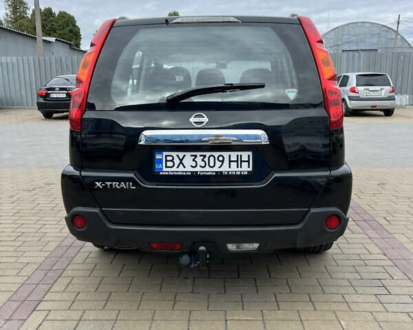 Чорний Ніссан ІксТрейл, об'ємом двигуна 2 л та пробігом 246 тис. км за 7800 $, фото 4 на Automoto.ua