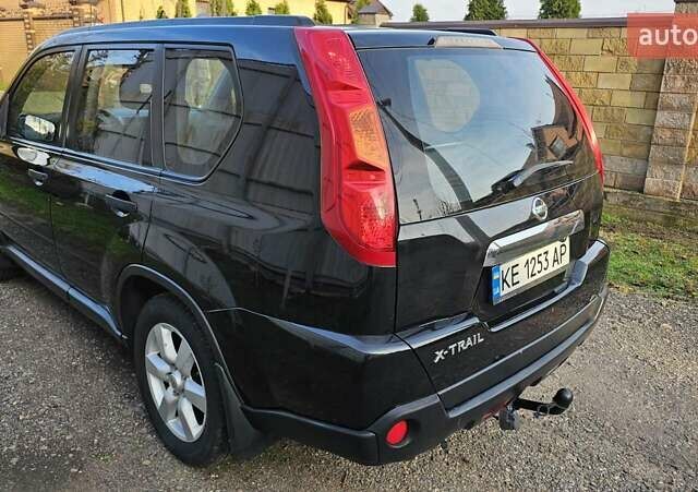 Черный Ниссан ИксТрейл, объемом двигателя 2 л и пробегом 230 тыс. км за 9000 $, фото 2 на Automoto.ua