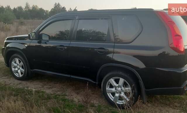 Черный Ниссан ИксТрейл, объемом двигателя 2 л и пробегом 182 тыс. км за 9300 $, фото 14 на Automoto.ua