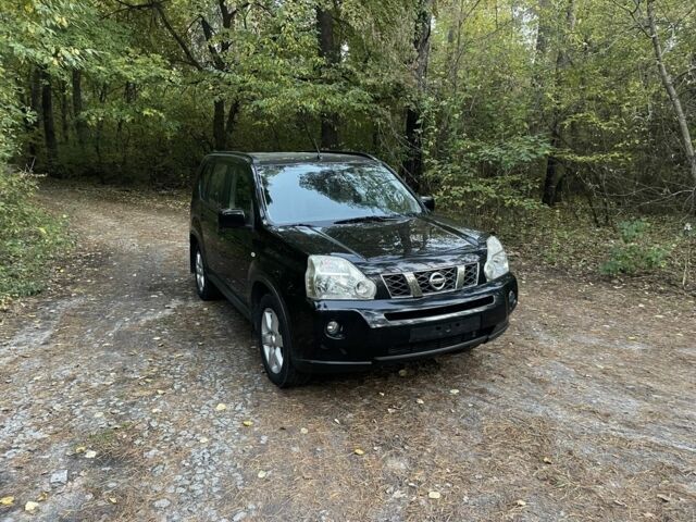 Черный Ниссан ИксТрейл, объемом двигателя 2.2 л и пробегом 200 тыс. км за 5800 $, фото 1 на Automoto.ua