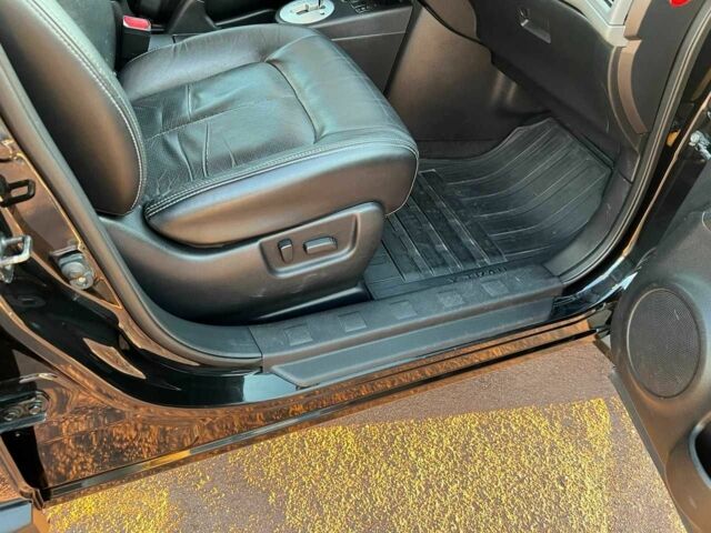 Чорний Ніссан ІксТрейл, об'ємом двигуна 2.5 л та пробігом 223 тис. км за 9172 $, фото 10 на Automoto.ua