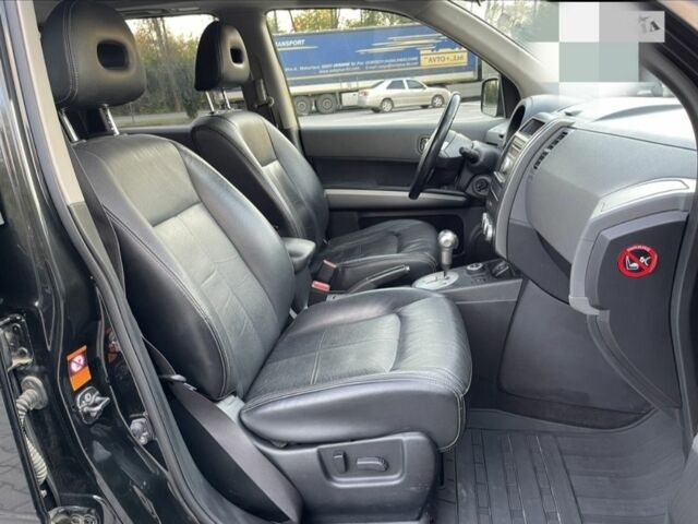 Черный Ниссан ИксТрейл, объемом двигателя 2 л и пробегом 242 тыс. км за 9300 $, фото 15 на Automoto.ua