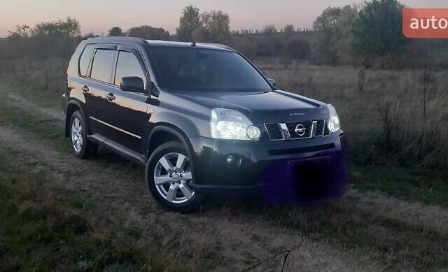 Черный Ниссан ИксТрейл, объемом двигателя 2 л и пробегом 182 тыс. км за 9300 $, фото 19 на Automoto.ua
