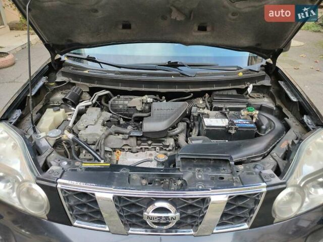 Черный Ниссан ИксТрейл, объемом двигателя 25 л и пробегом 213 тыс. км за 9725 $, фото 4 на Automoto.ua