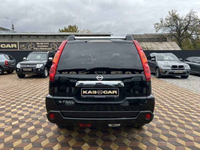 Черный Ниссан ИксТрейл, объемом двигателя 2 л и пробегом 148 тыс. км за 10750 $, фото 7 на Automoto.ua