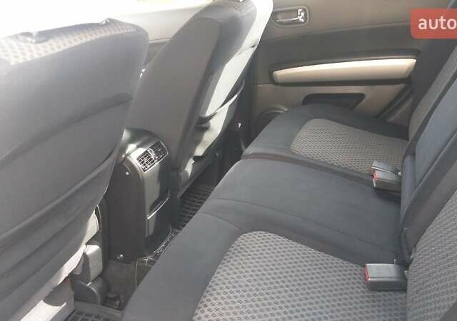 Черный Ниссан ИксТрейл, объемом двигателя 2 л и пробегом 182 тыс. км за 9300 $, фото 10 на Automoto.ua