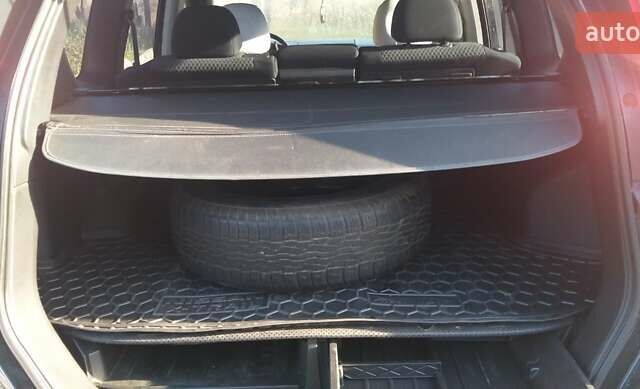 Черный Ниссан ИксТрейл, объемом двигателя 2 л и пробегом 182 тыс. км за 9300 $, фото 1 на Automoto.ua