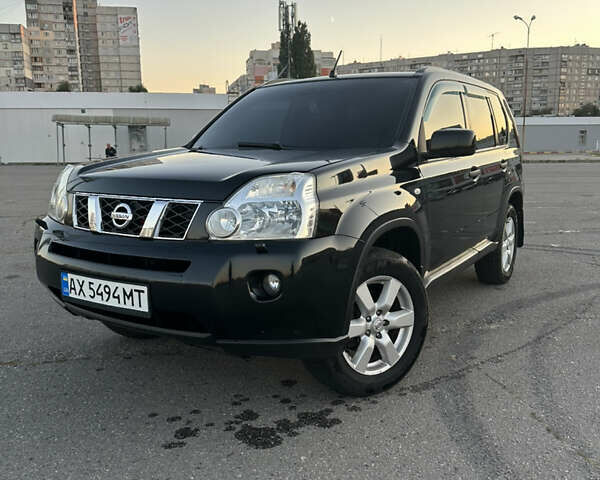 Черный Ниссан ИксТрейл, объемом двигателя 2 л и пробегом 305 тыс. км за 10700 $, фото 13 на Automoto.ua