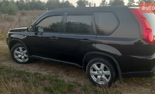 Черный Ниссан ИксТрейл, объемом двигателя 2 л и пробегом 182 тыс. км за 9300 $, фото 15 на Automoto.ua