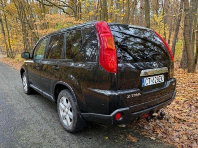 Черный Ниссан ИксТрейл, объемом двигателя 2.2 л и пробегом 232 тыс. км за 3200 $, фото 2 на Automoto.ua