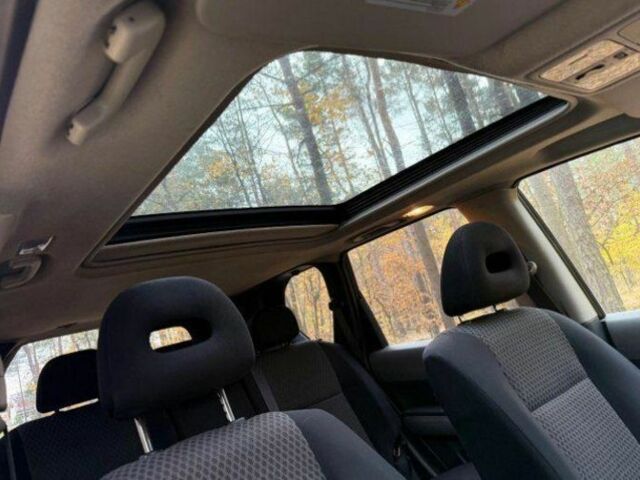 Черный Ниссан ИксТрейл, объемом двигателя 2.2 л и пробегом 232 тыс. км за 3200 $, фото 5 на Automoto.ua