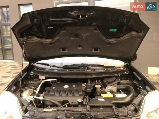Чорний Ніссан ІксТрейл, об'ємом двигуна 2 л та пробігом 223 тис. км за 8999 $, фото 6 на Automoto.ua
