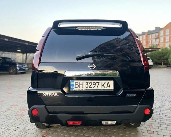 Черный Ниссан ИксТрейл, объемом двигателя 2.49 л и пробегом 157 тыс. км за 14500 $, фото 4 на Automoto.ua