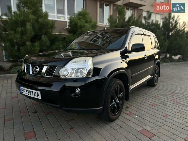 Черный Ниссан ИксТрейл, объемом двигателя 2.49 л и пробегом 157 тыс. км за 14500 $, фото 1 на Automoto.ua