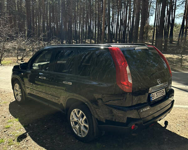 Черный Ниссан ИксТрейл, объемом двигателя 2 л и пробегом 226 тыс. км за 13000 $, фото 3 на Automoto.ua