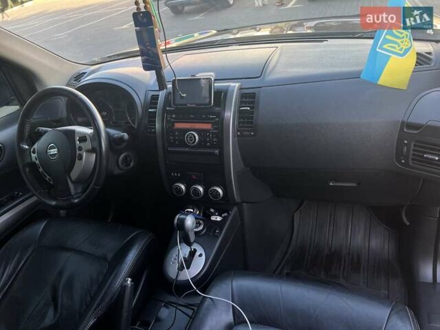 Черный Ниссан ИксТрейл, объемом двигателя 2.49 л и пробегом 157 тыс. км за 14500 $, фото 22 на Automoto.ua