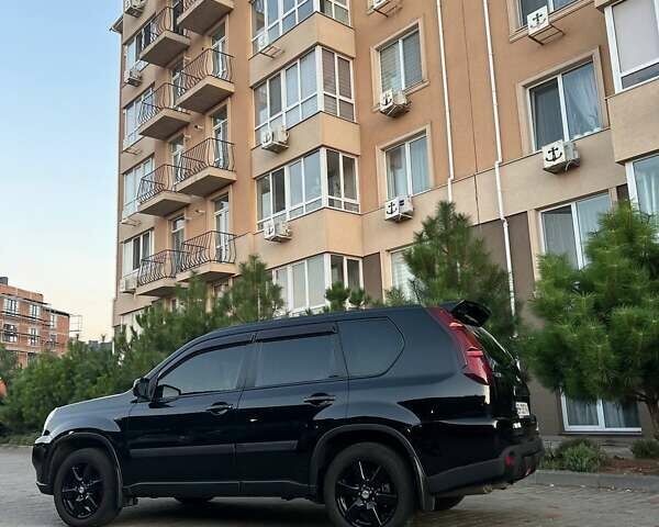 Черный Ниссан ИксТрейл, объемом двигателя 2.49 л и пробегом 157 тыс. км за 14500 $, фото 11 на Automoto.ua