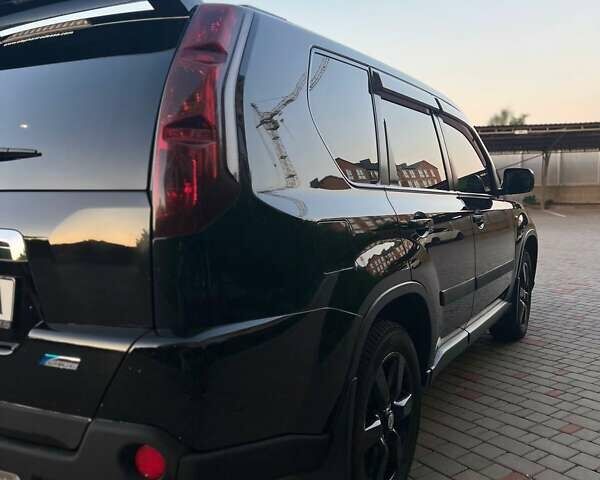 Черный Ниссан ИксТрейл, объемом двигателя 2.49 л и пробегом 157 тыс. км за 14500 $, фото 5 на Automoto.ua