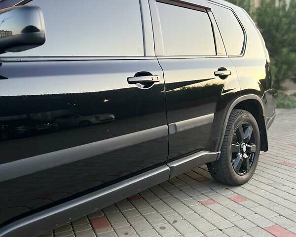 Черный Ниссан ИксТрейл, объемом двигателя 2.49 л и пробегом 157 тыс. км за 14500 $, фото 9 на Automoto.ua