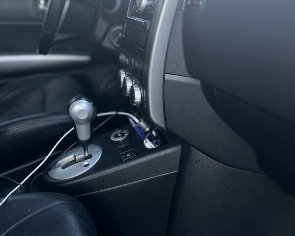 Черный Ниссан ИксТрейл, объемом двигателя 2.49 л и пробегом 157 тыс. км за 14500 $, фото 24 на Automoto.ua