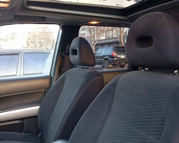 Черный Ниссан ИксТрейл, объемом двигателя 2 л и пробегом 238 тыс. км за 10500 $, фото 5 на Automoto.ua