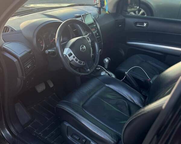 Черный Ниссан ИксТрейл, объемом двигателя 2.49 л и пробегом 157 тыс. км за 14500 $, фото 12 на Automoto.ua