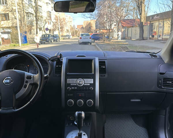 Черный Ниссан ИксТрейл, объемом двигателя 2 л и пробегом 226 тыс. км за 13000 $, фото 13 на Automoto.ua