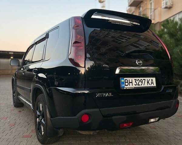 Черный Ниссан ИксТрейл, объемом двигателя 2.49 л и пробегом 157 тыс. км за 14500 $, фото 6 на Automoto.ua