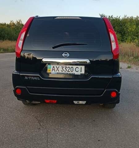 Черный Ниссан ИксТрейл, объемом двигателя 2.49 л и пробегом 215 тыс. км за 9900 $, фото 10 на Automoto.ua