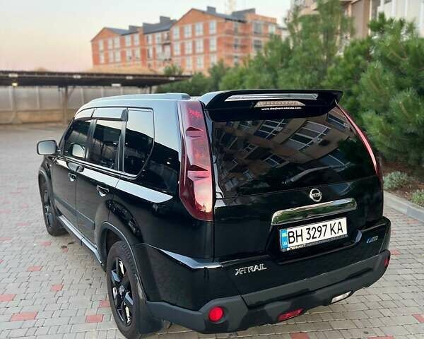 Черный Ниссан ИксТрейл, объемом двигателя 2.49 л и пробегом 157 тыс. км за 14500 $, фото 3 на Automoto.ua