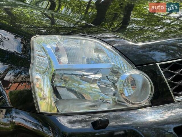 Чорний Ніссан ІксТрейл, об'ємом двигуна 2 л та пробігом 159 тис. км за 10600 $, фото 4 на Automoto.ua