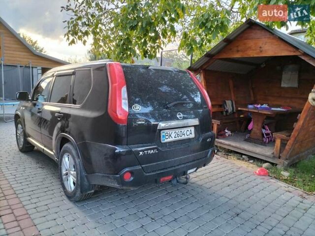 Черный Ниссан ИксТрейл, объемом двигателя 2 л и пробегом 207 тыс. км за 12750 $, фото 3 на Automoto.ua
