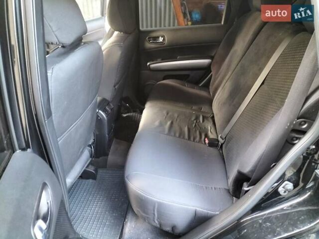 Черный Ниссан ИксТрейл, объемом двигателя 2 л и пробегом 207 тыс. км за 12750 $, фото 8 на Automoto.ua