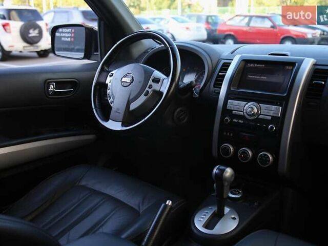 Черный Ниссан ИксТрейл, объемом двигателя 2 л и пробегом 213 тыс. км за 11999 $, фото 10 на Automoto.ua