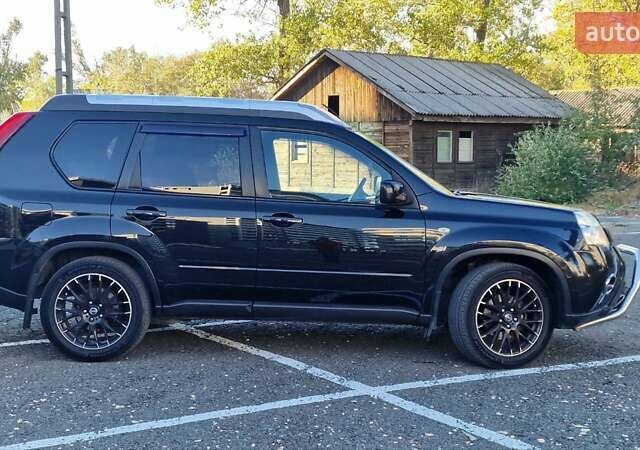 Чорний Ніссан ІксТрейл, об'ємом двигуна 2 л та пробігом 179 тис. км за 12500 $, фото 3 на Automoto.ua