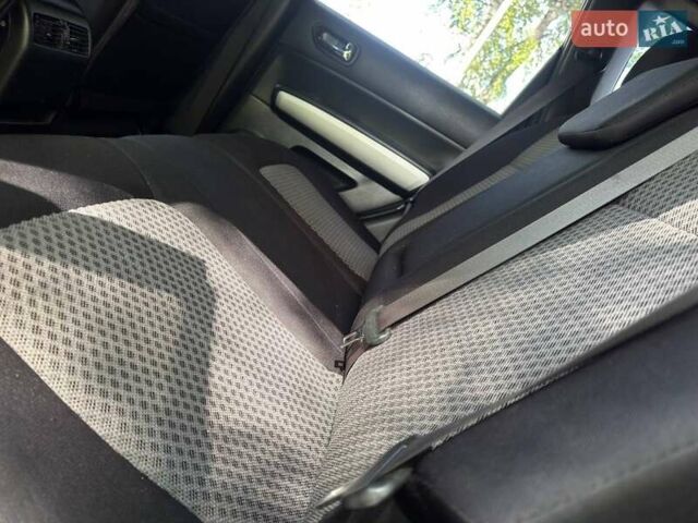 Чорний Ніссан ІксТрейл, об'ємом двигуна 2 л та пробігом 159 тис. км за 10600 $, фото 31 на Automoto.ua