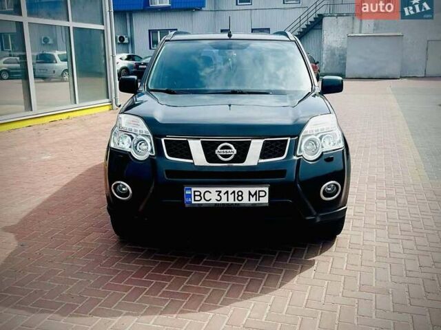 Черный Ниссан ИксТрейл, объемом двигателя 2 л и пробегом 169 тыс. км за 10500 $, фото 1 на Automoto.ua