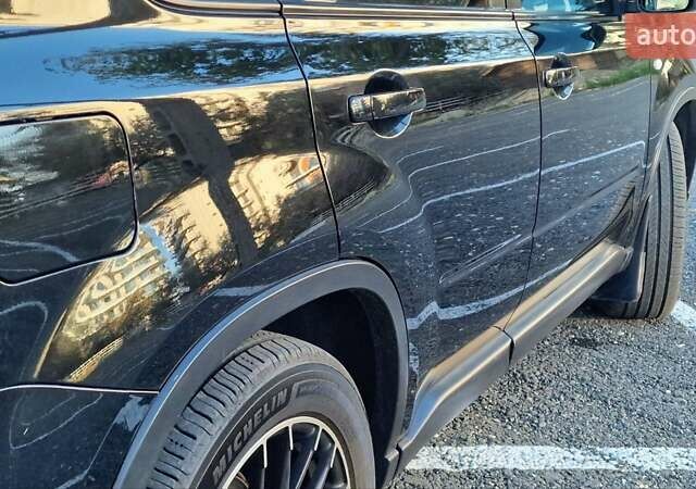 Чорний Ніссан ІксТрейл, об'ємом двигуна 2 л та пробігом 179 тис. км за 12500 $, фото 6 на Automoto.ua