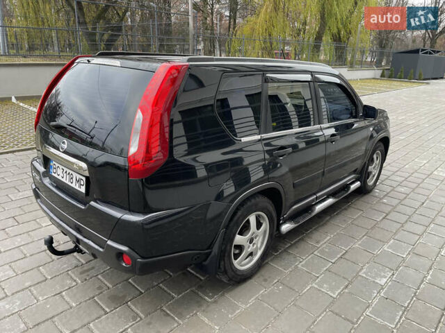 Черный Ниссан ИксТрейл, объемом двигателя 2 л и пробегом 169 тыс. км за 10900 $, фото 7 на Automoto.ua