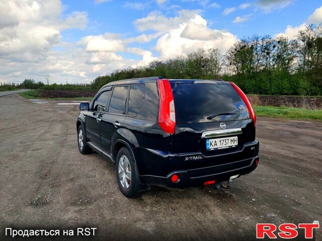 Черный Ниссан ИксТрейл, объемом двигателя 2 л и пробегом 210 тыс. км за 13240 $, фото 3 на Automoto.ua