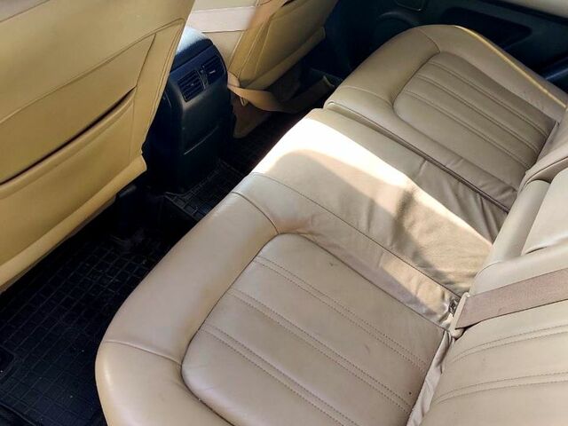 Черный Ниссан ИксТрейл, объемом двигателя 2 л и пробегом 210 тыс. км за 13240 $, фото 4 на Automoto.ua