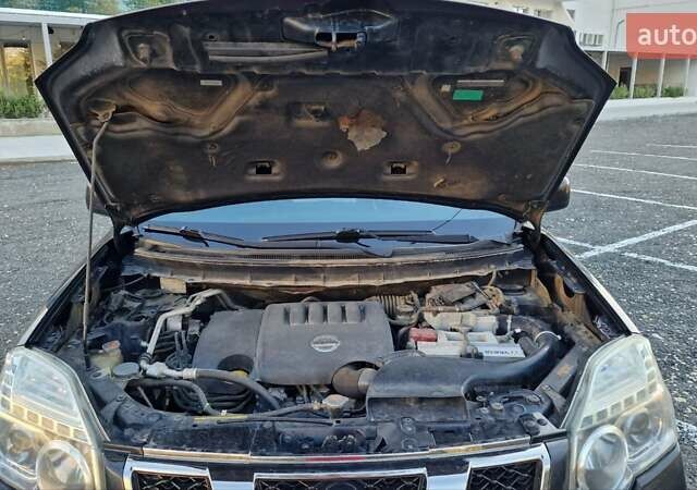 Чорний Ніссан ІксТрейл, об'ємом двигуна 2 л та пробігом 179 тис. км за 12500 $, фото 14 на Automoto.ua