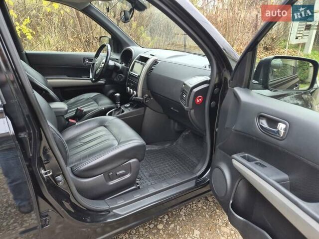 Чорний Ніссан ІксТрейл, об'ємом двигуна 2 л та пробігом 226 тис. км за 12300 $, фото 7 на Automoto.ua